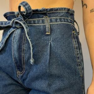 Denim culottes with paper bag waist and tie belt.